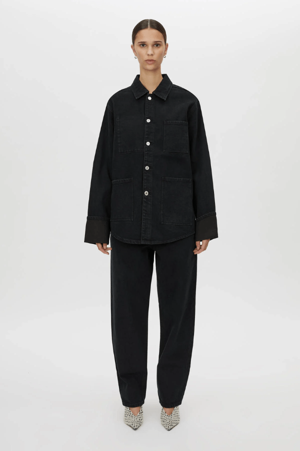 Rhodes 2.0 Denim Jean Inky Black by Camilla and Marc, low-rise tapered fit with logo rivets and patch pockets, perfect for effortless off-duty dressing.