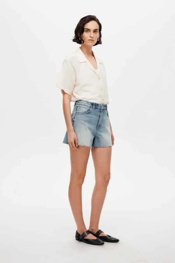 Ryder Short Cosmic by Neuw Denim, a trendy high-rise short with a flattering silhouette, contrast stitching, and signature repair stitch. Perfect for all-season, sustainable style.