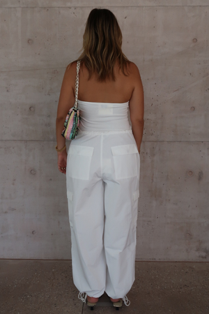 Cargo Link Pants White by Sneaky Link, versatile low-rise cargo pants with adjustable waist and hem ties for a laid-back or cuffed streetwear look.