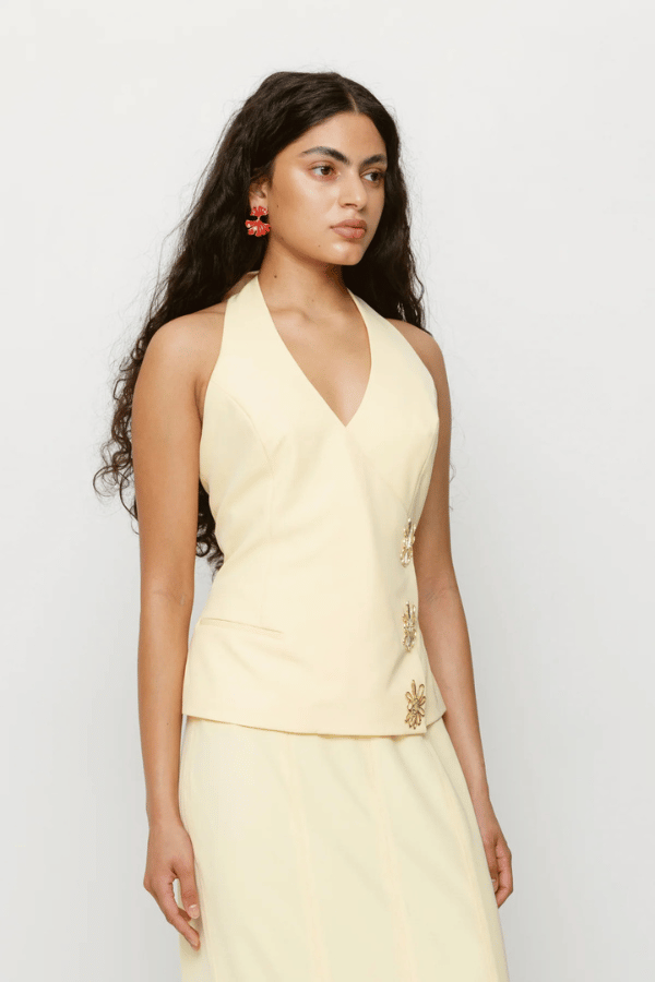 Inka Vest Top Aqua by The Wolf Gang, a halter crop with custom hardware and asymmetric closure. Perfect for sets or sleek solo styling.