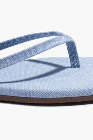 Square Toe Lily Washed Denim by Tkees, a square-toe slide sandal in soft washed denim with a cushioned denim insole and rubber outsole. Handcrafted in Brazil for comfort and style.