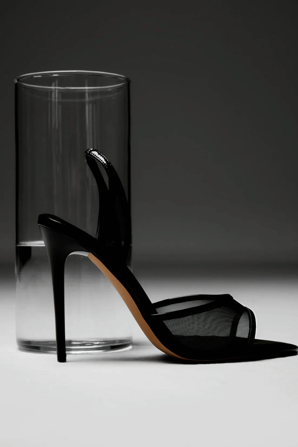 Maddison Sandal Black Mesh & Patent Leather by Lana Wilkinson, sheer slingback heel with glossy trim for bold and elegant evening looks.
