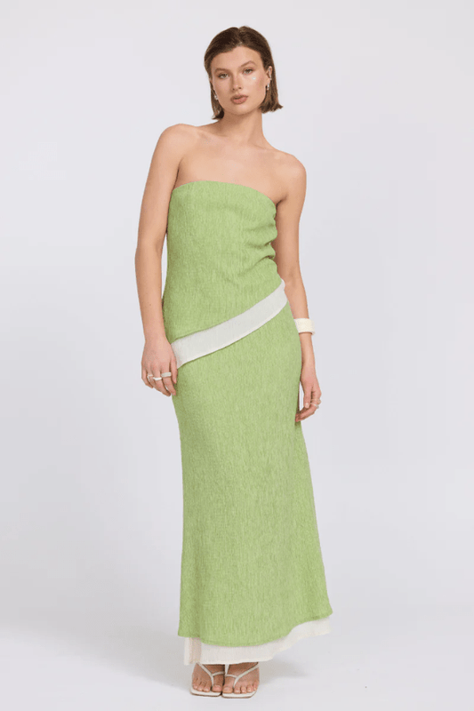 Aperitivo Top Pistachio/Cream by Sovere — strapless, longline, textured lyocell blend with concealed elastic and asymmetric hem. Reversible design. Model: 178cm, size 8.