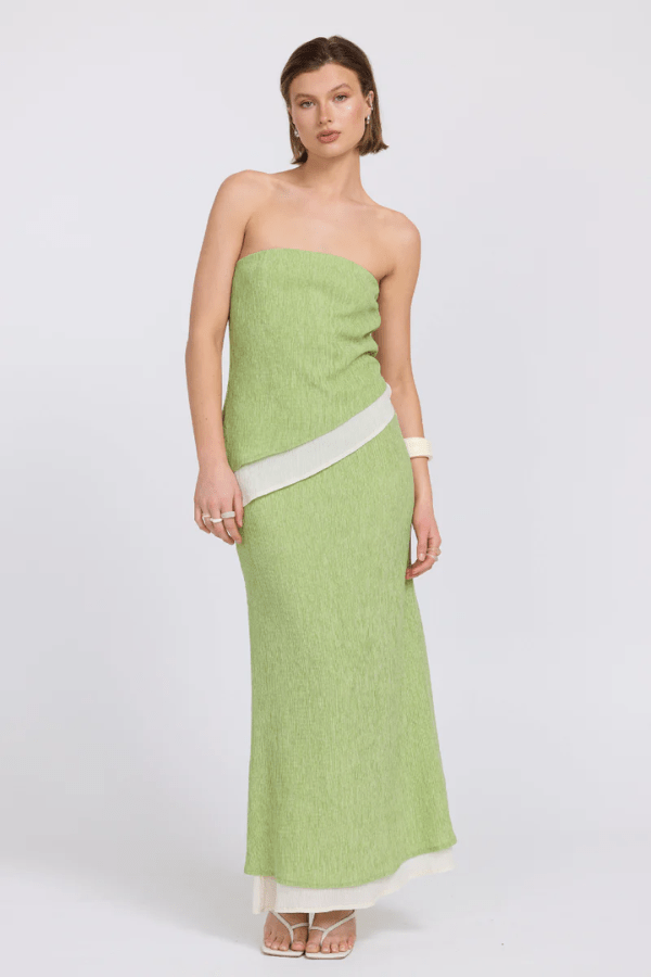 Aperitivo Top Pistachio/Cream by Sovere — strapless, longline, textured lyocell blend with concealed elastic and asymmetric hem. Reversible design. Model: 178cm, size 8.