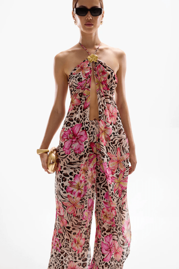 Coral Orchid Drape Top Safaria by Cin Cin – Lightweight 100% viscose with vibrant florals and animal print. Adjustable halter tie and gold clasp. Perfect for summer.