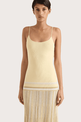 Citara Maxi Dress Butter Stripe by Faithfull the Brand – Trendy ribbed knit maxi with adjustable straps and backless tie, perfect for effortless summer elegance and beach days.