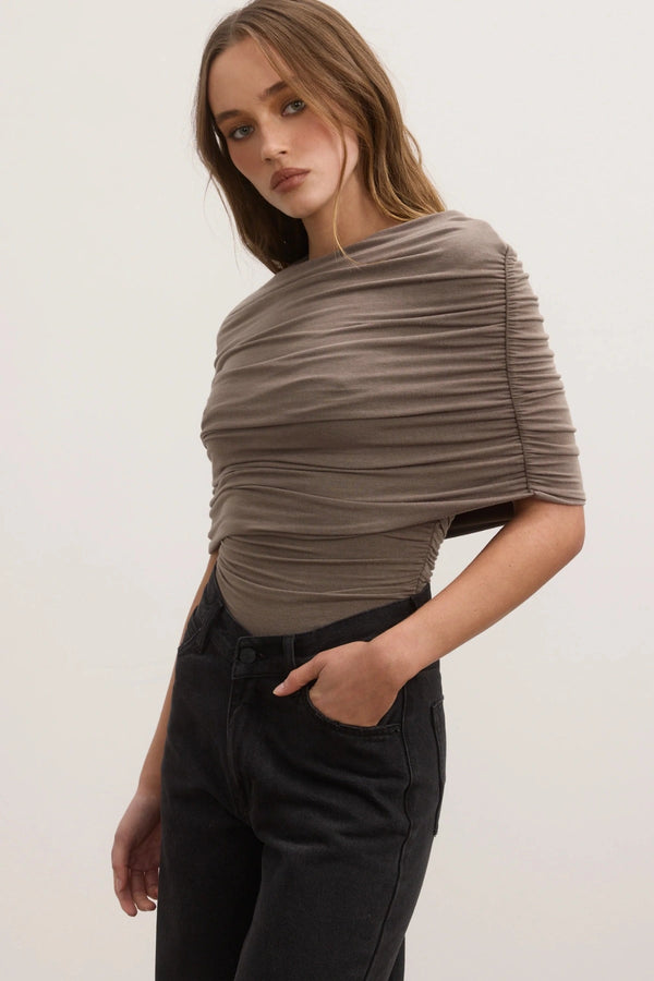 Bayse Daisy Bodysuit in Mink, a sculpted stretch-fit design with high neckline and all-over ruching for a sleek finish.