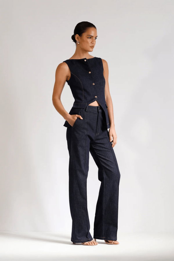 Good Vibes Top Indigo by Pasduchas – Trendy stretch denim with structured fit, gold snap studs, and mock pockets; perfect for chic, coordinated looks.