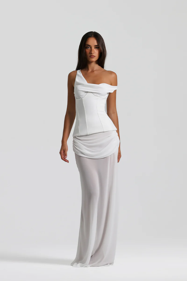 Cadence Dress White by Natalie Rolt, featuring a bias-cut georgette silhouette, off-shoulder detail, removable corset, and gathered skirt, offering both structured and relaxed styling options.