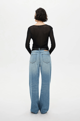 Daria Short Tempest by Neuw Denim, a trendy mid-rise, relaxed boyfriend fit with a low-slung design, featuring a signature repair stitch and fob ring. Perfect for laid-back days.