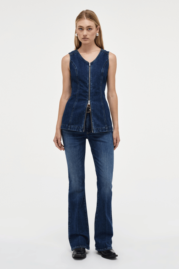 Milla Zip Tunic Dark Indigo by Neuw Denim, trendy slim-fit denim vest with a double-ended zipper for adjustable styling. Perfect for a modern or '70s-inspired look, crafted from rigid denim that molds to your body over time.