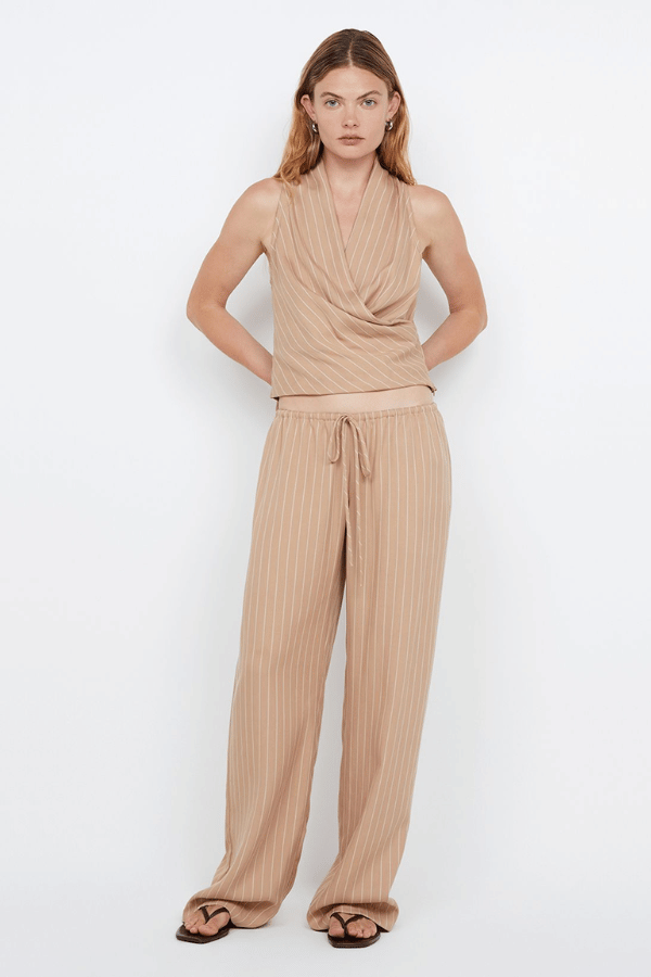 Almeria Wrap Top Camel Stripe by Bec + Bridge – Trendy wrap top with draped V-neck and racer back, perfect for effortless warm-weather elegance and viral summer looks.
