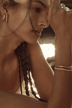 Gisele Earrings by Amber Sceats, trendy double hoop design with AAA+ freshwater pearls, handcrafted in Italy for timeless elegance and sophistication.