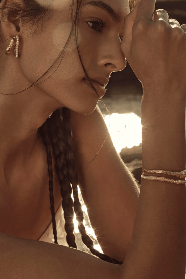 Gisele Earrings by Amber Sceats, trendy double hoop design with AAA+ freshwater pearls, handcrafted in Italy for timeless elegance and sophistication.