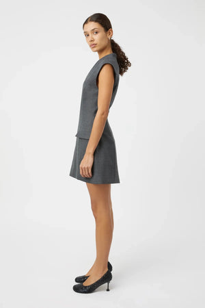 Seidler Mini Dress Dark Charcoal by Camilla and Marc – Trendy wool mini with deep V-neckline, front box pleat, and side pockets, perfect for refined daywear and polished evening looks.