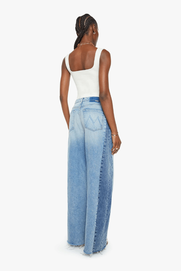 Pipe Dream Button Sneak Fray in Blinded By The Dark by MOTHER, Super high-rise rigid jeans with barrel-leg fit and frayed hem for vintage-meets-modern style.