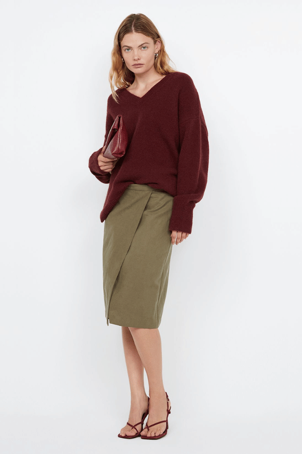 Campbell V Neck Jumper Plum by Bec + Bridge – Soft mohair blend knit with a flattering V neckline, ribbed collar and cuffs. Relaxed fit with dropped shoulders and pull-on style. Cold hand wash.