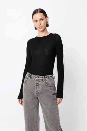 Maine Long Sleeve Top Black by Mossman – A viral, lightweight Merino wool essential with a sleek round neck and body-skimming fit, perfect for year-round layering or solo wear.