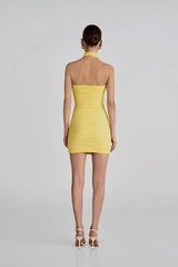 Quimera Mini Dress Mimosa by Maygel Coronel – Versatile ruched mini with 3D floral, open back, and straps styled in multiple ways.