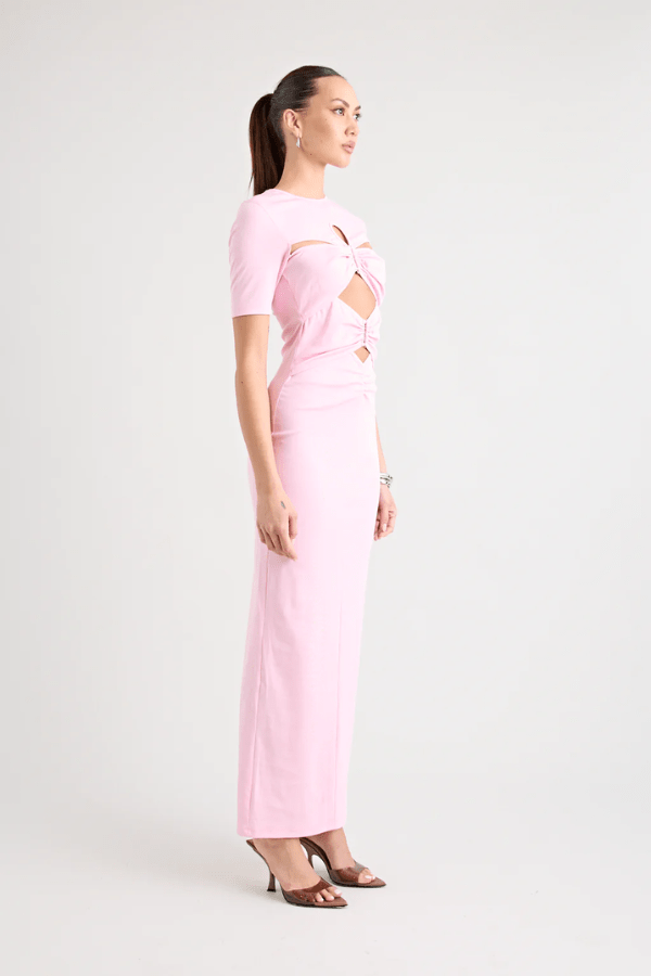 Florence Dress Pink by Pfeiffer – A trendy fitted maxi with cut-out hardware accents, crafted from soft cotton-spandex. Perfect for chic, ethical day-to-night wear. Made in Australia with care.