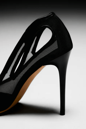 Catherine Heel Black by Lana Wilkinson — Sleek sheer mesh pump with leather trim and 10.5cm stiletto heel. Bold and sophisticated for evening or statement looks.