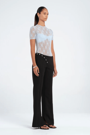 Porter Bodysuit Blue by Benni — Stretch lace bodysuit with high neck, soft jersey lining, open back with hook-and-eye closure, G-string panty, and snap crotch for sleek, practical style.