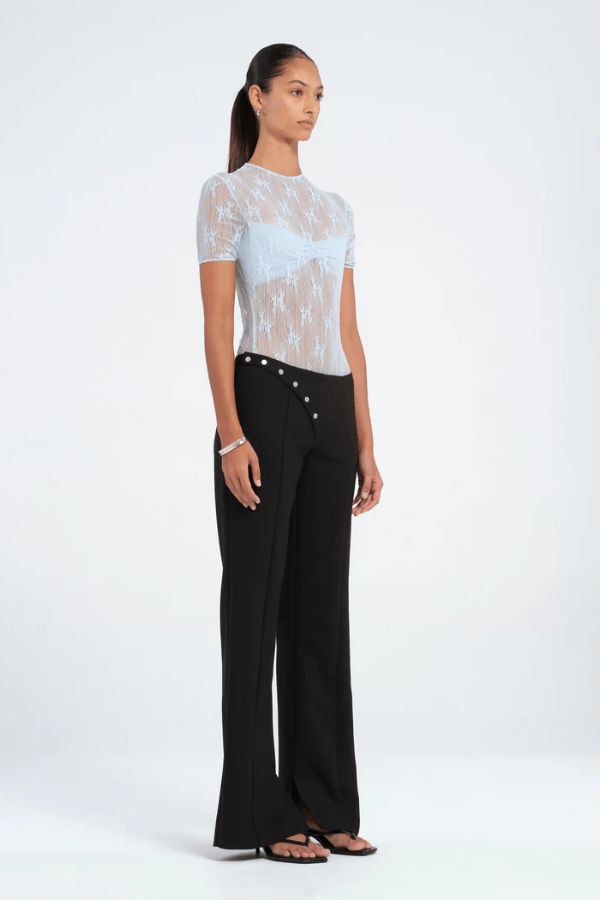 Porter Bodysuit Blue by Benni — Stretch lace bodysuit with high neck, soft jersey lining, open back with hook-and-eye closure, G-string panty, and snap crotch for sleek, practical style.