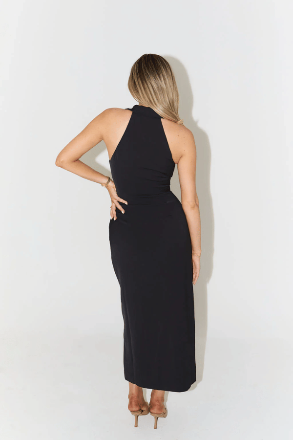 The Ultimate Muse Collar Maxi Dress Black by Odd Muse – A sharp-collared, sleeveless maxi with button front and front slit, perfect for summer dinners, holiday escapes, or elegant city strolls.