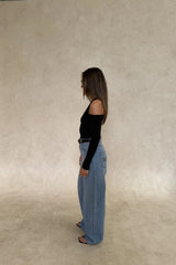 Issy Long Sleeve Top Black by Sneaky Link – Luxuriously soft modal-spandex with an off-shoulder neckline and built-in halter for support. Delicate fabric; handle gently. Cold hand wash.