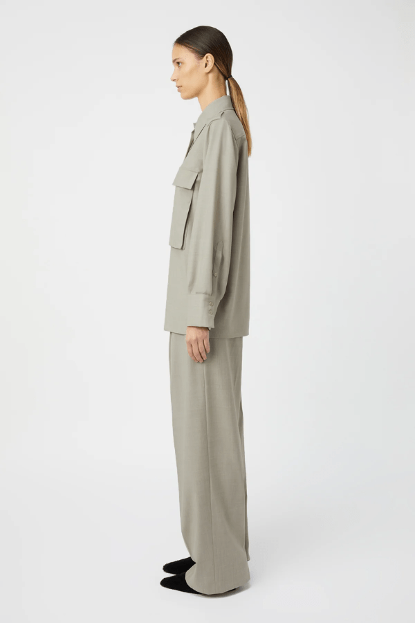 Drew Shirt Mottled Stone by Camilla and Marc – Oversized boxy shirt with 3D utility pockets, shoulder epaulettes with branded buttons, and concealed button placket. Crafted in soft wool-poly blend.