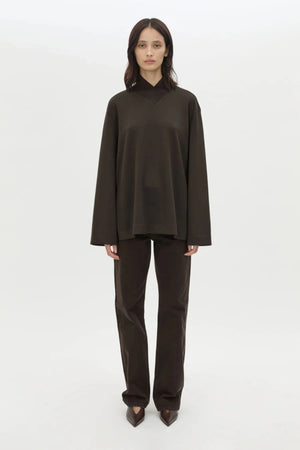 Bessette Long Sleeve Top in Espresso by Camilla and Marc, a sleek high-neck layer with side splits and tonal seam detailing.