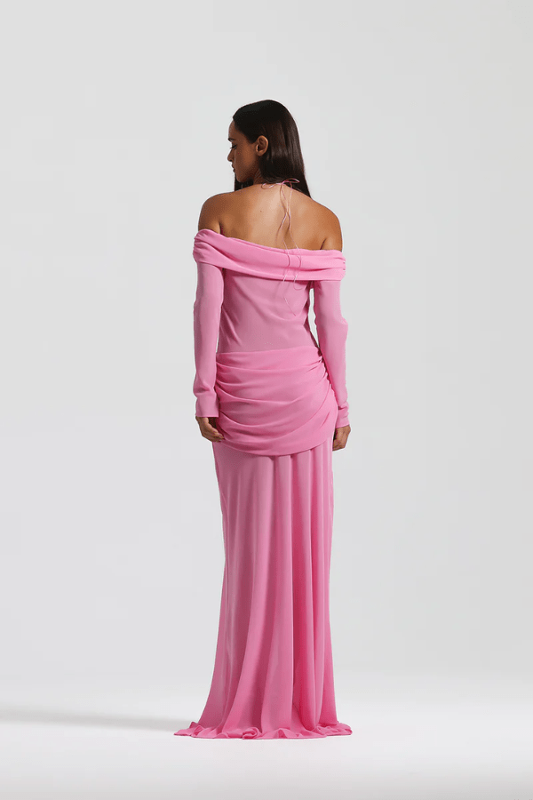 Emily Gown Candy Pink by Natalie Rolt – A trendy, ethereal georgette gown with off-shoulder draping and fluid bias cut, perfect for special occasions and statement-making moments.