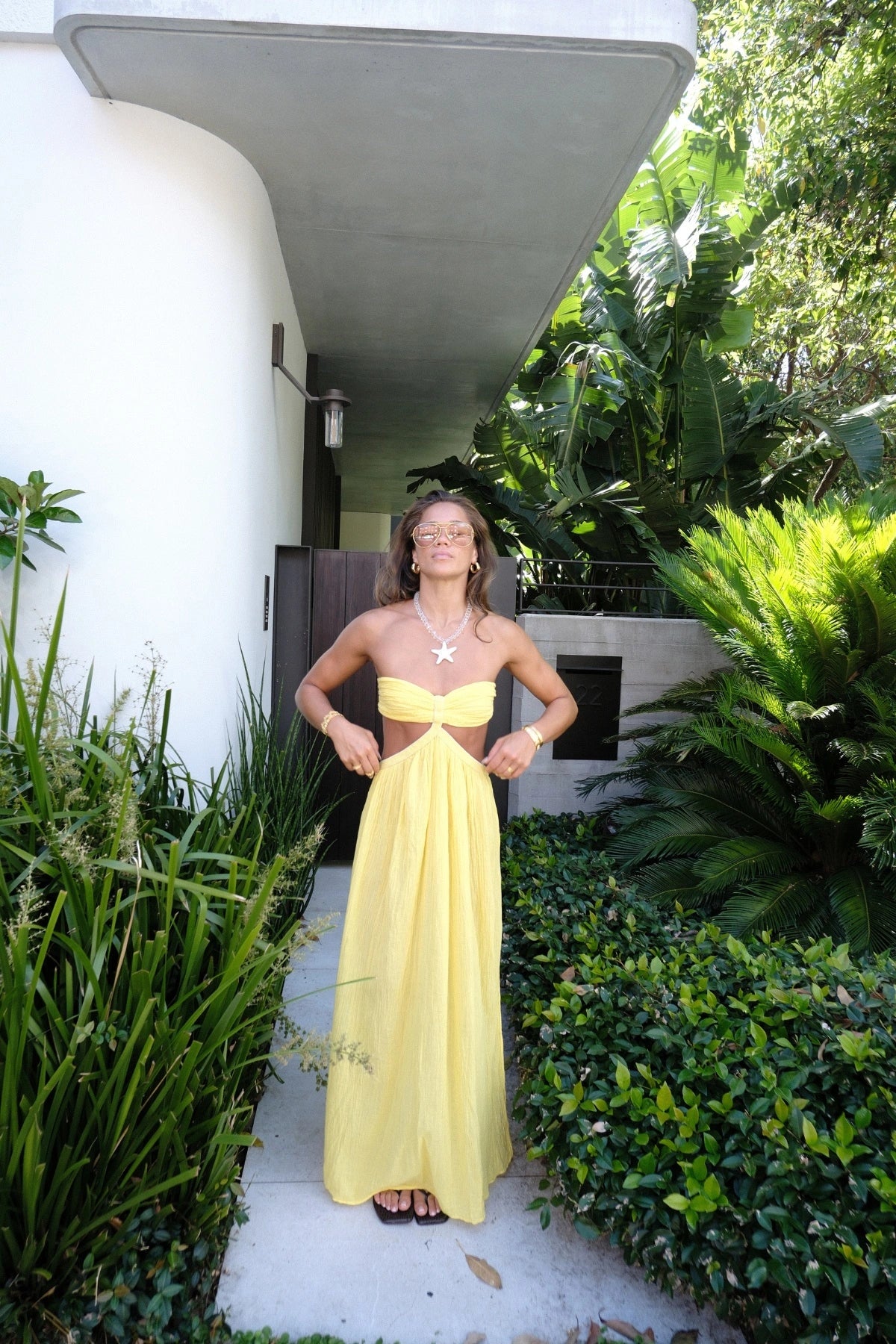 Chloe Dress Lemon by D'Artemide – Cotton strapless dress with ruched back, maxi skirt, side split, and low back detail.
