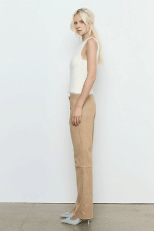 Sabado Combo Knit Cream by Sovere – Trendy two-piece knit set with a fluffy V-neck sweater and ribbed tank, perfect for layering in casual or chic looks.