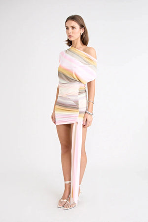Elara Reversible Dress by Pfeiffer — peach printed mini dress with three-way reversible design and dramatic hem tie detail.