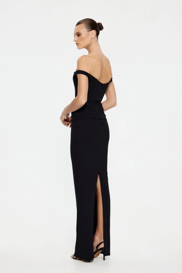 Hayward Gown Black by Effie Kats – An off-shoulder stretch-crepe gown with all-over ruching and a back split, perfect for black-tie events, red carpet moments, or evening galas.