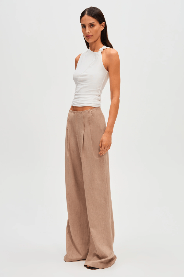 Simone Pant taupe by Misha, wide-leg pants with trendy frayed details and front pleats, perfect for casual or formal wear with a relaxed fit.