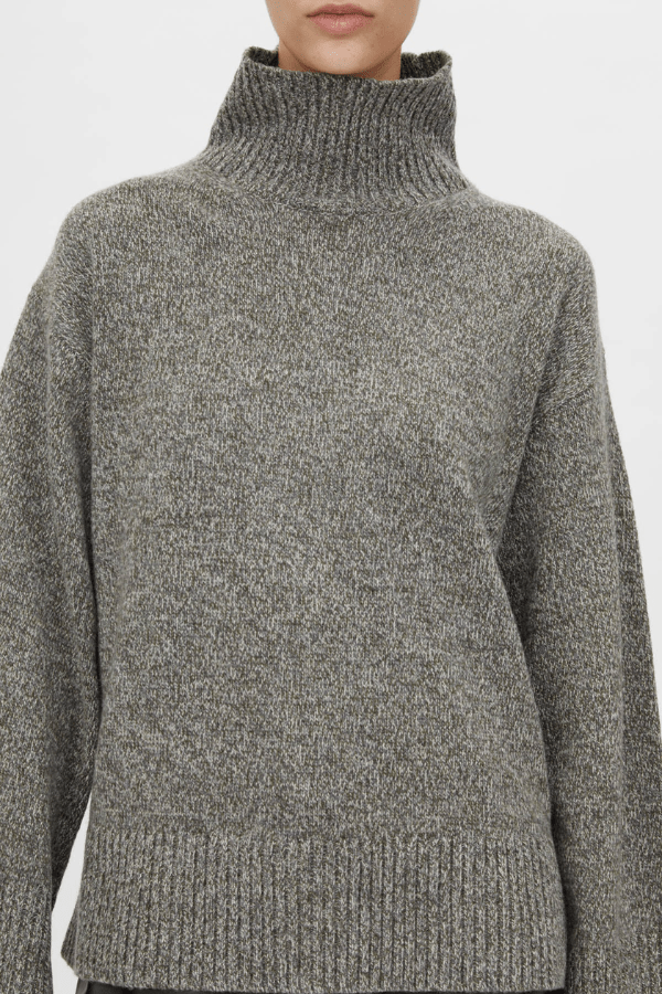 Breccia Knit Sweater Khaki by Camilla and Marc – Trendy oversized merino wool sweater with ribbed details and a modern split back, perfect for casual layering.