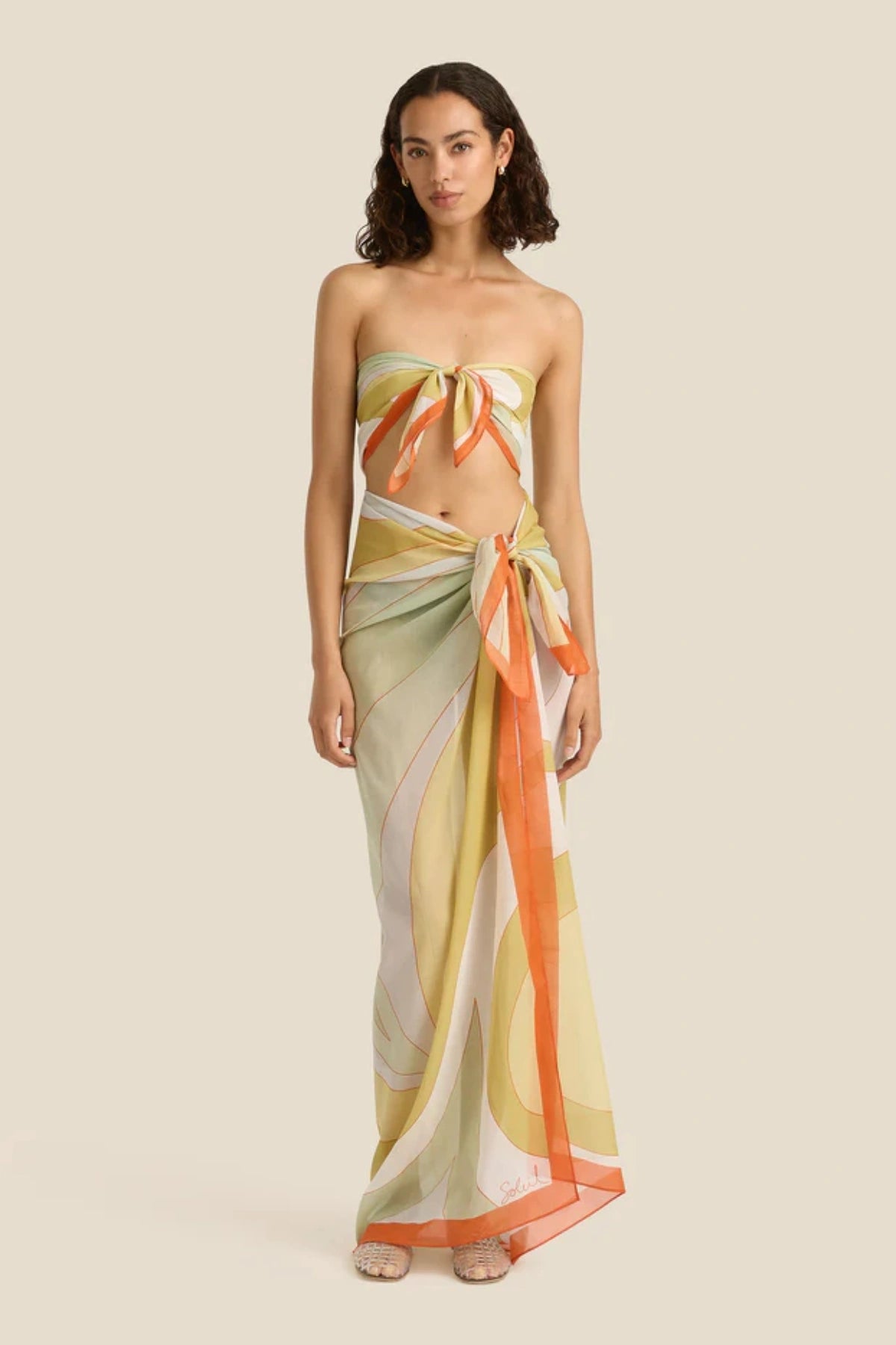 Square Pareo in Essence by Soleil Soleil, a lightweight organic cotton wrap or scarf with paisley-inspired colour-block print, perfect for sun-drenched days.