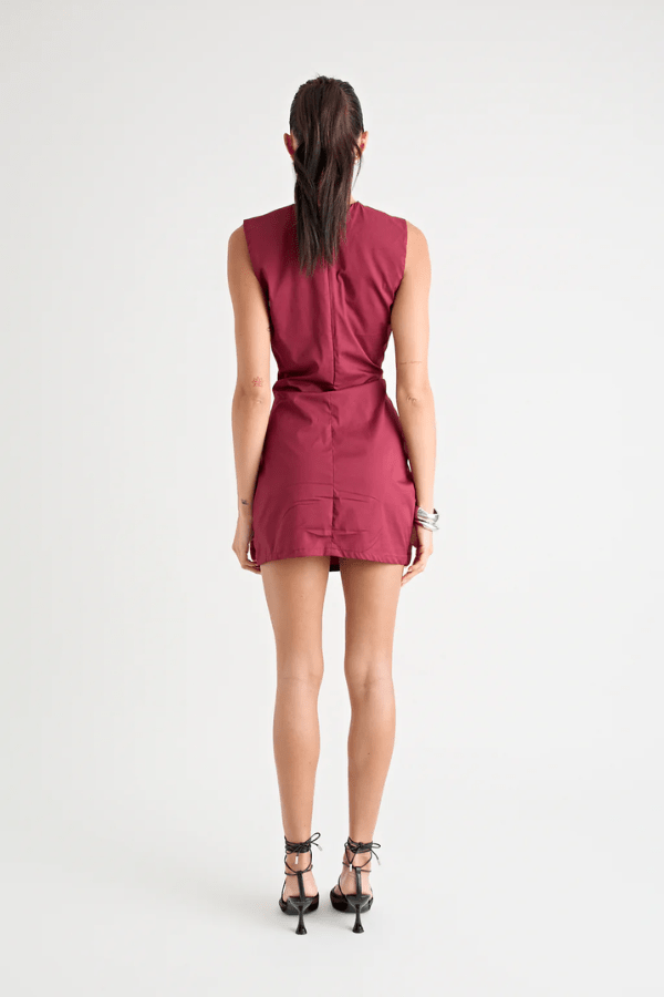 Salma Mini Dress New Wine by Pfeiffer – A flirty, chic mini with a flattering V-neck, signature hip tucks, and seamless invisible back zip, perfect for any occasion.