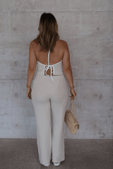 Charlie Pant Sand/White by Sneaky Link, trendy and comfortable low-rise pants with elastic waist and contrast drawcord, perfect for chic summer days and evenings.
