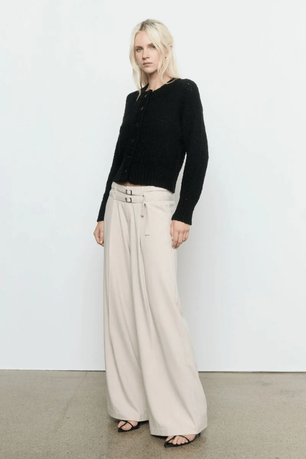 Allure Cardigan Black by Sovere Studio – Breathable 100% cotton knit with crew neck, button front, dropped shoulders, and ribbed details. Relaxed fit, perfect for layering.