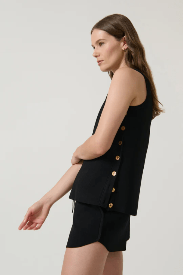 Anabel Top Black by Onte – Trendy A-line silhouette in heavy crepe knit with gold buttons, perfect for polished day-to-night looks and pairing with Pilar Shorts.
