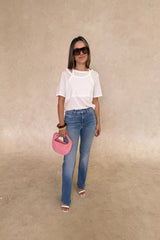 Layered Tee in White by Sneaky Link, 100% cotton with a relaxed fit and layered neckline detail. Perfect for elevated casual dressing.
