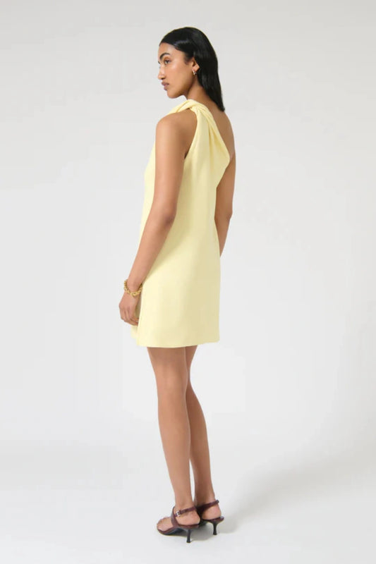 Loreta Twist Dress – Butter by Onte, a crepe knit mini with one-shoulder twist. Perfect for elevated summer dressing or nights out.