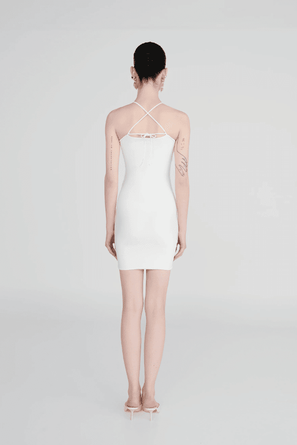 Coari Off White by Maygel Coronel – Ruched cutout halter mini dress with 3D flowers and adjustable straps for versatile wear.