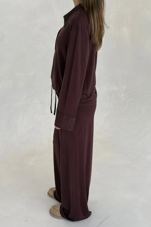 Hunter Long Sleeve Polo Top Chocolate by Sneaky Link, ultra soft stretch polo with a second-skin fit and button neckline.