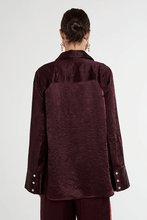 Cuff Shirt Plum by Summi Summi — Silky lightweight shirt with a structured collar and flared oversized cuffed sleeves. Crafted from 100% acetate woven fabric.