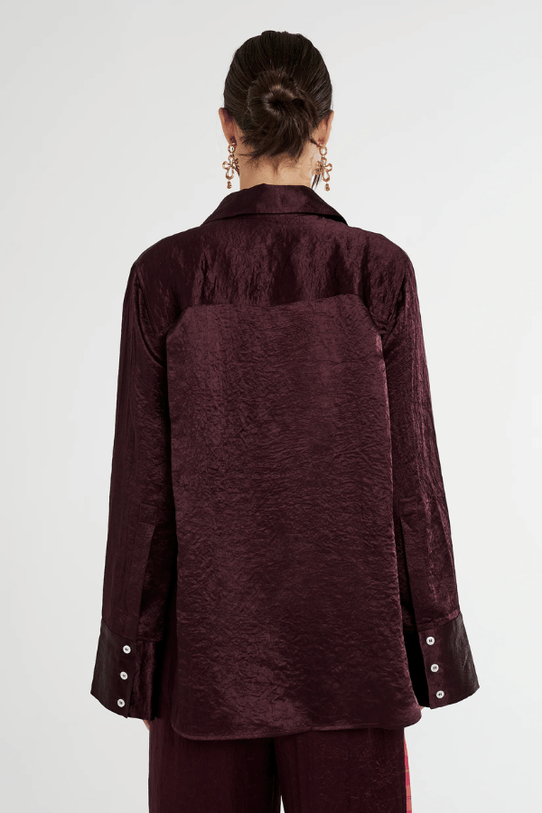 Cuff Shirt Plum by Summi Summi — Silky lightweight shirt with a structured collar and flared oversized cuffed sleeves. Crafted from 100% acetate woven fabric.