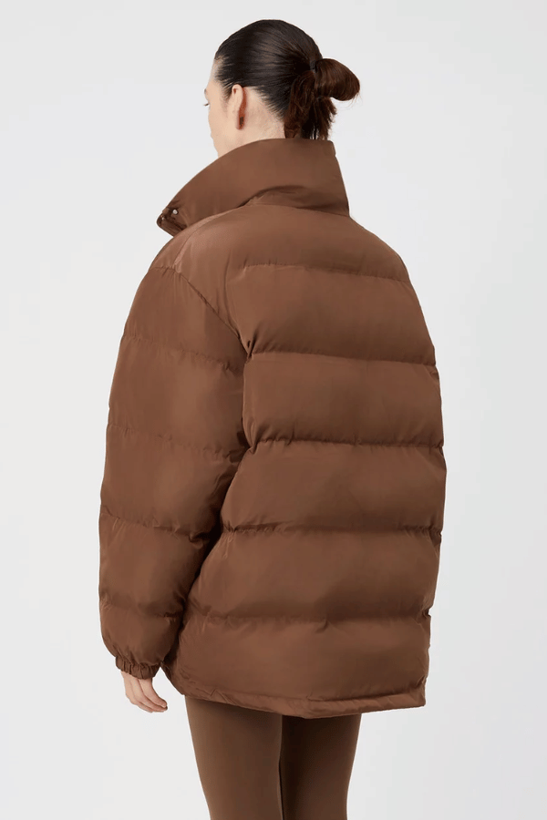 Alcove Puffer Jacket Chestnut by Camilla and Marc, oversized long-line puffer with recycled padding and high collar for warm, polished winter style.